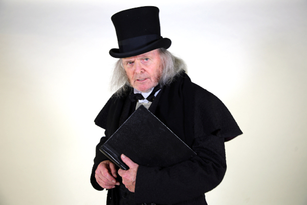 Photo of Richard Doyle with a top hat and black jacket