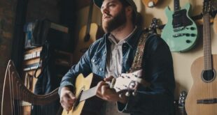 Ross Thorn with guitar