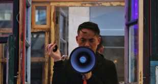 Ken Ueno with megaphone